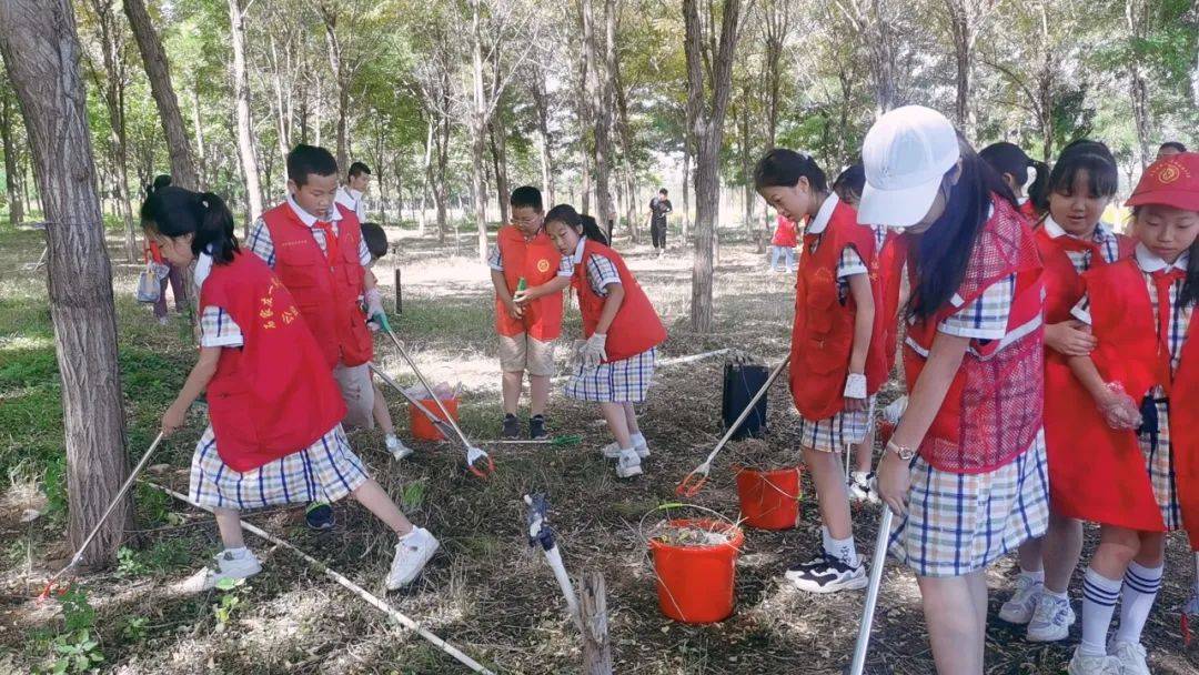 【一家人志愿者在行动】护河净滩志愿者“滩主”齐上阵开云体育 开云平台(图1)